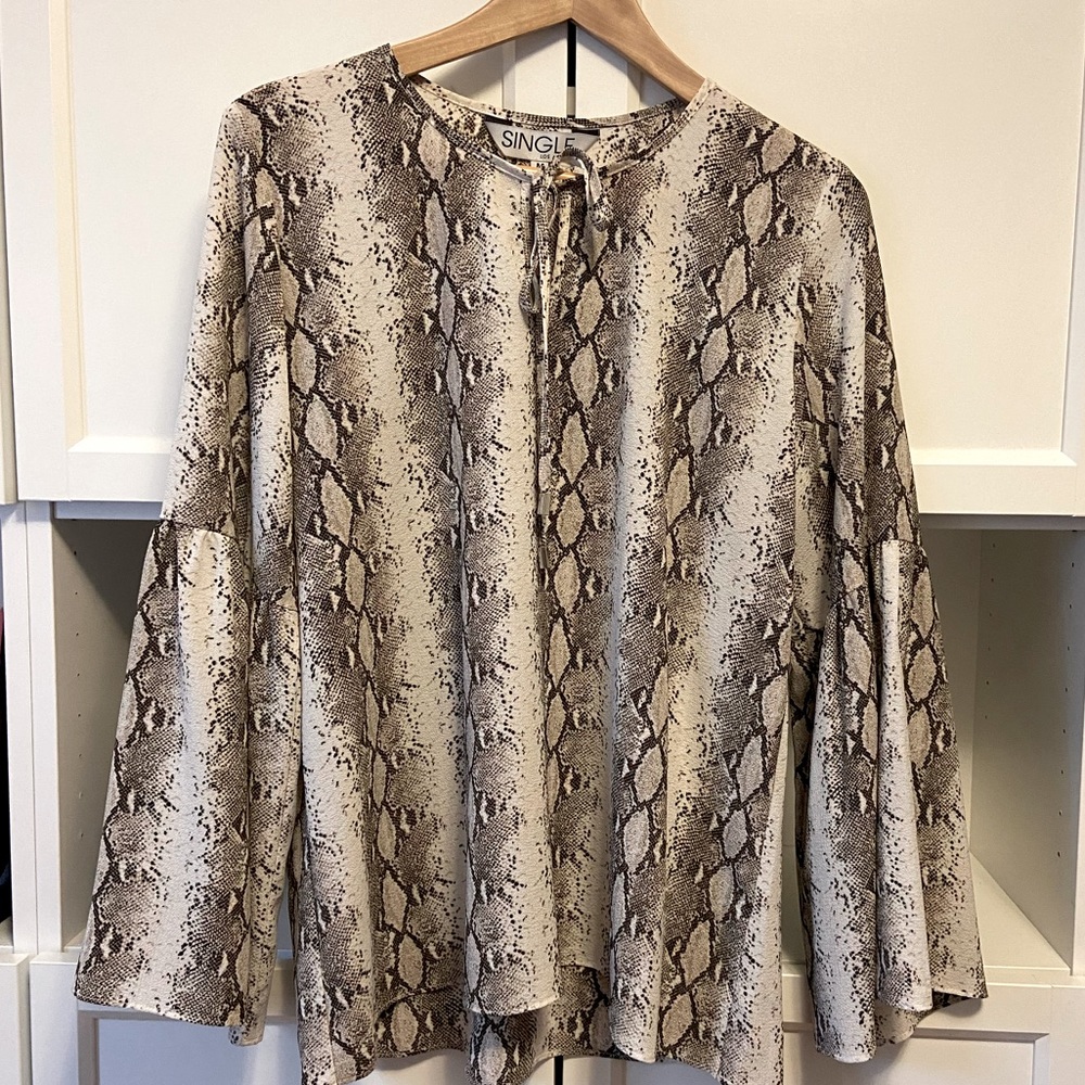SINGLE long flare sleeve snake skin print blouse, with tie.